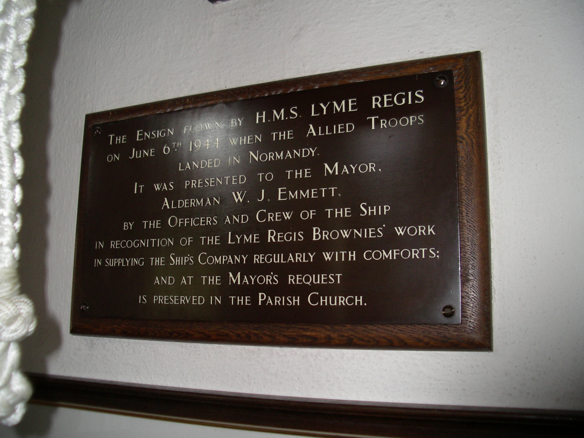 HMS LYME REGIS BELL AND ENSIGN - War Memorials Online